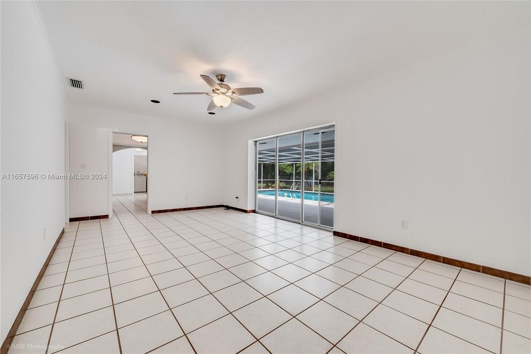 Generously-Sized Poolside Family Room Overlooking Pool