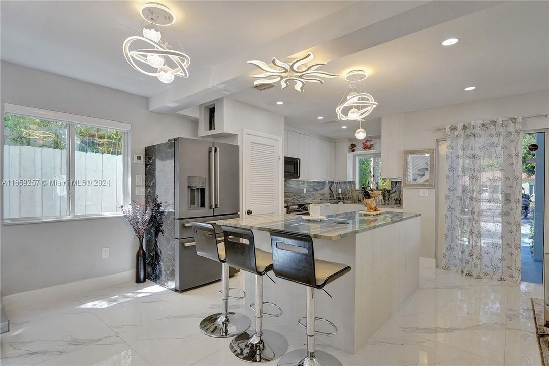 Brand new kitchen with the most luxurious appliances found on the market: “Café”, and Quartzite countertops and backsplash, a rarest stone more expensive and durable than granite.