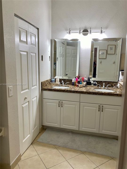 His and Hers vanity and walking closet