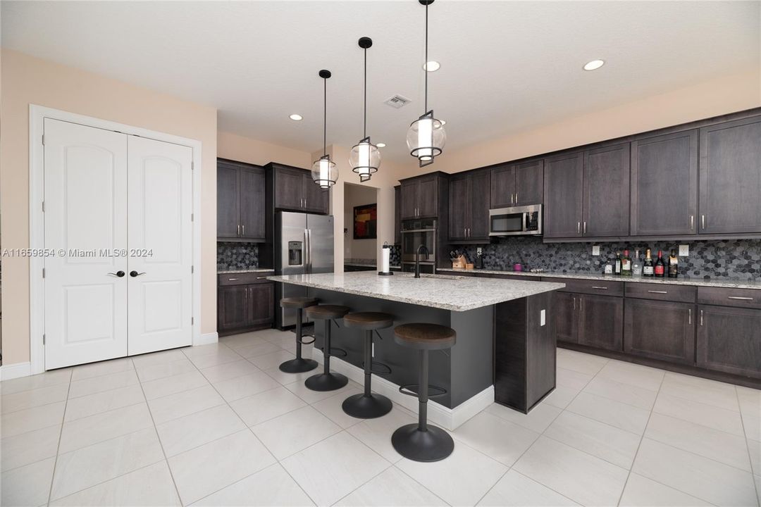 KITCHEN AREA, DOUBLE PANTRY DOOR