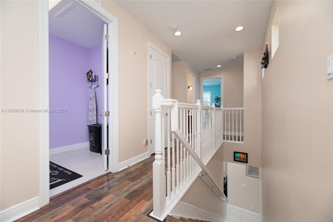 UPSTAIRS LAUNDRY, LOTS AND LOTS OF SPACE IN THIS LAUNDRY ROOM