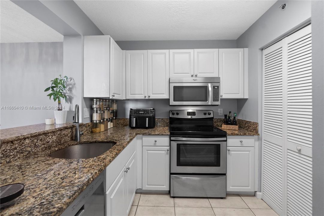 Spacious kitchen with a touch-activated sink.