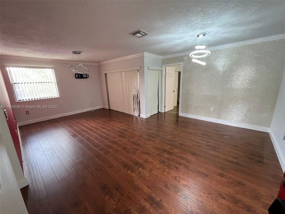 spacious living room/dining room area