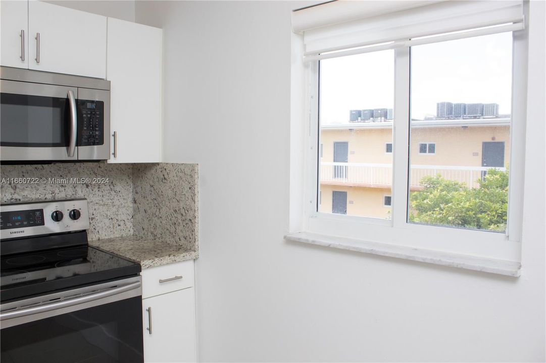 Kitchen window provides brightness to the unit. Not all 1 bedrooms have kitchen windows.