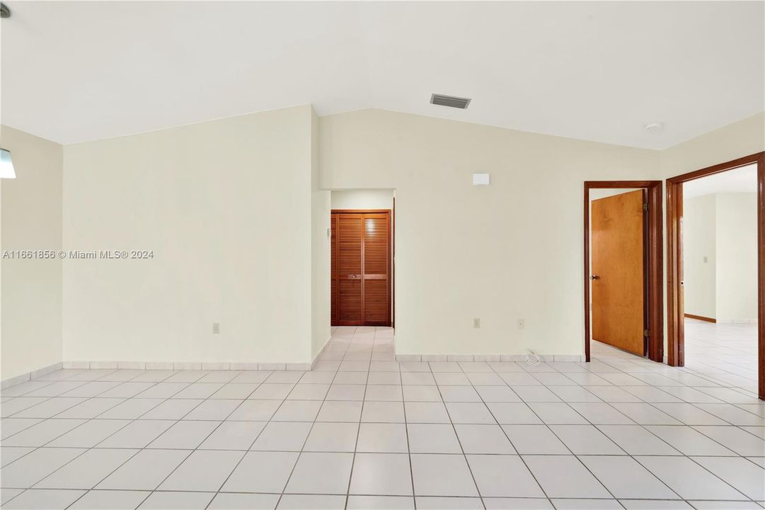 Dining Room. On the right, two entrances to two different rooms.