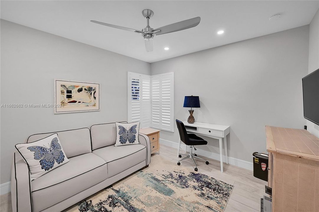 2nd bedroom with two corner windows