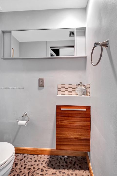 Cleverly designed 1/2 Bath on first floor