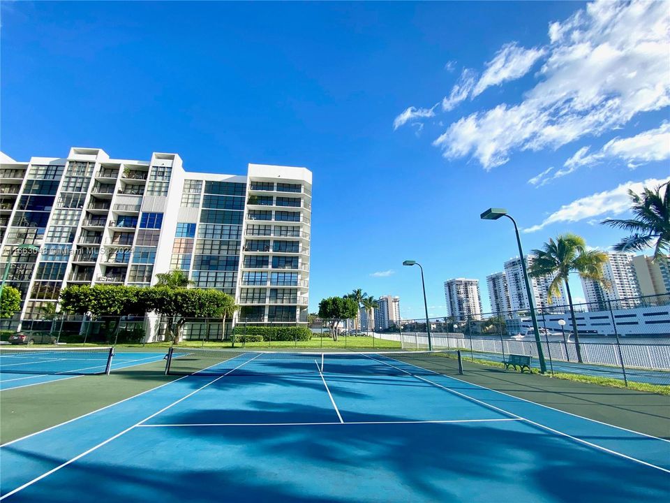 Waterfront Tennis Courts at Oceanview Park Condo. 1000 Parkview Drive, #824 - Three Islands / Hallandale Beach. Unit #824 is listed For Sale.