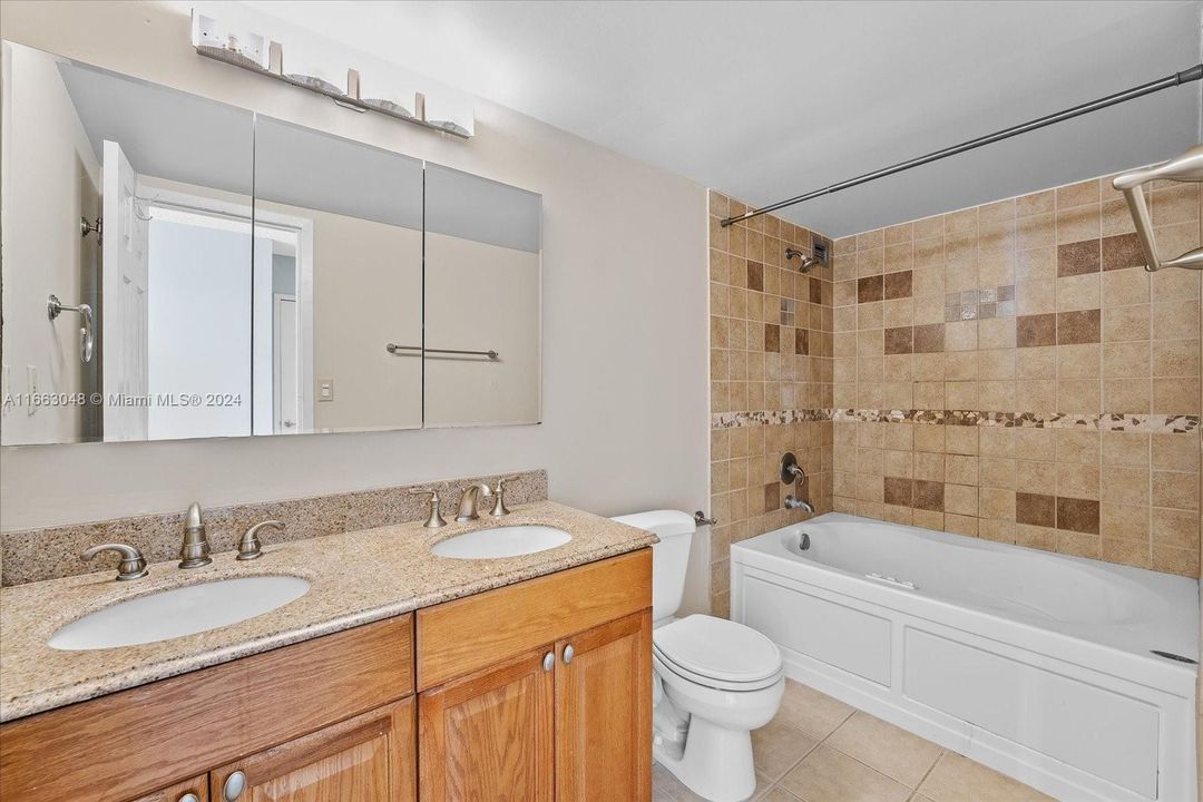 Main Bathroom with Jacuzzi Tub.