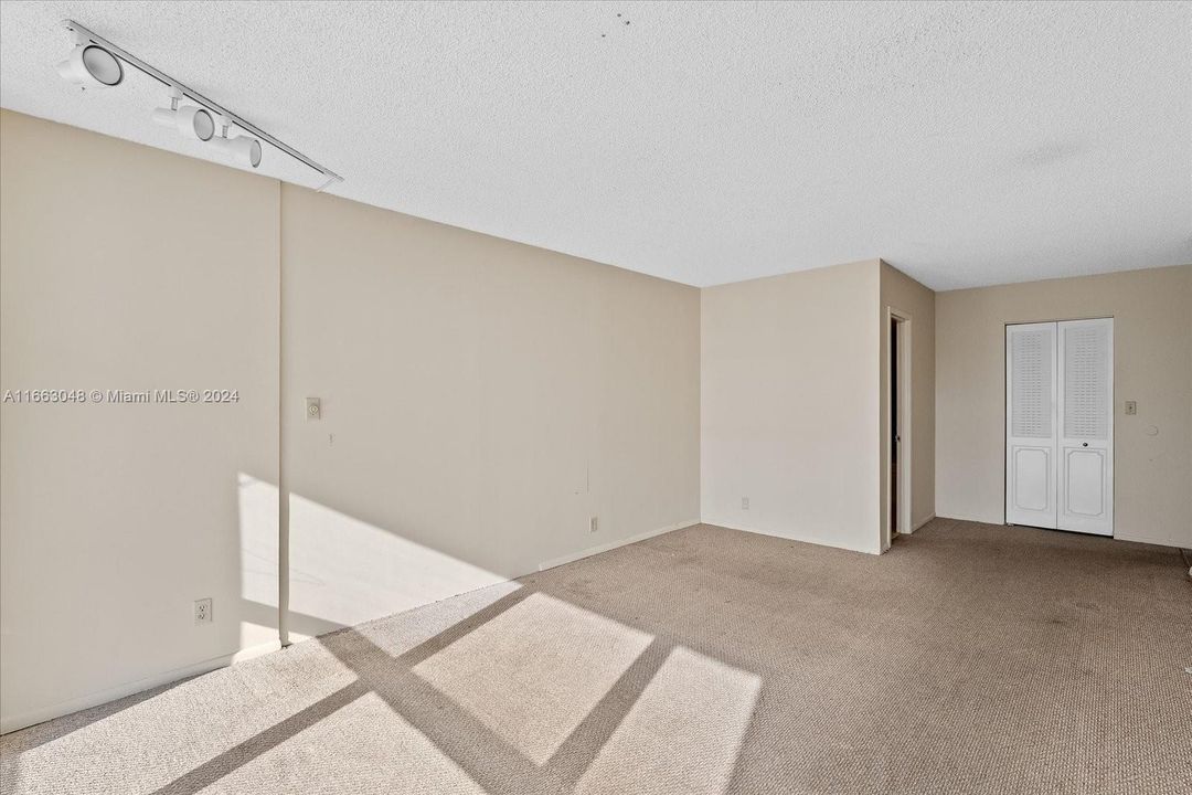 Main Bedroom with entrance to the Main Bathroom and the extra large walk-in closet.1000 Parkview Drive, #824 at Oceanview Park Condominium.