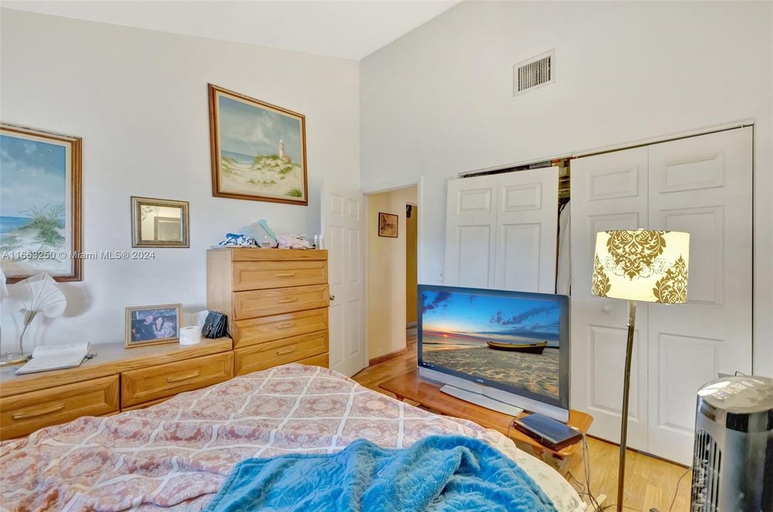 Primary Bedroom fits King Bed and lots of furniture. Volume Ceiling