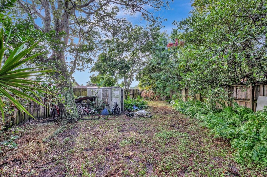 Large oversized private fenced backyard