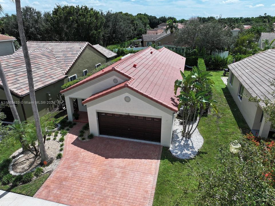 Wide paved driveway offers a beautiful curb appeal