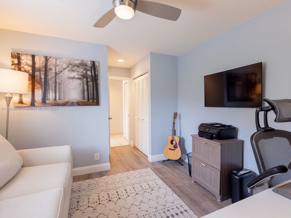 Secondary bedroom/nursery currently used as a home office