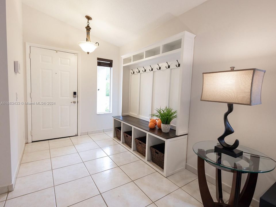 Entry foyer with custom built cubbies (can stay or can be removed)