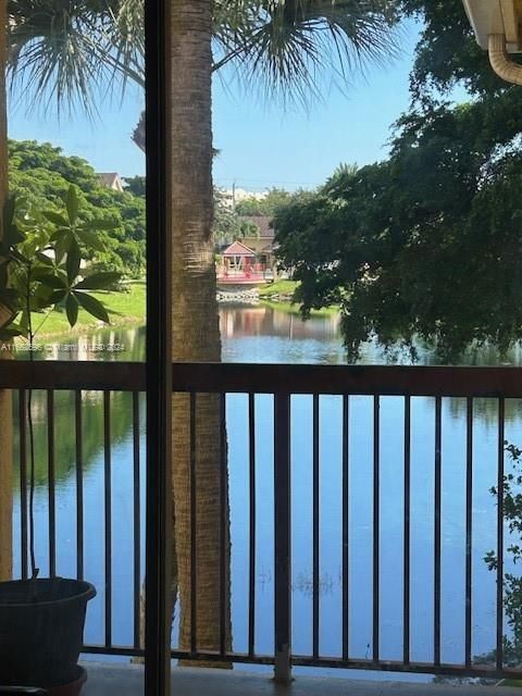 Primary/master bedroom balcony overlooking lake