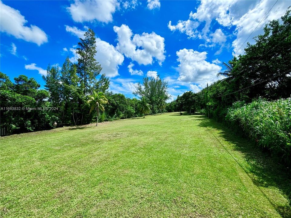 Beautiful 1.6 acres of buildable land across from Killian Greens golf course. Build your mansion on this one of a kind deep lot.