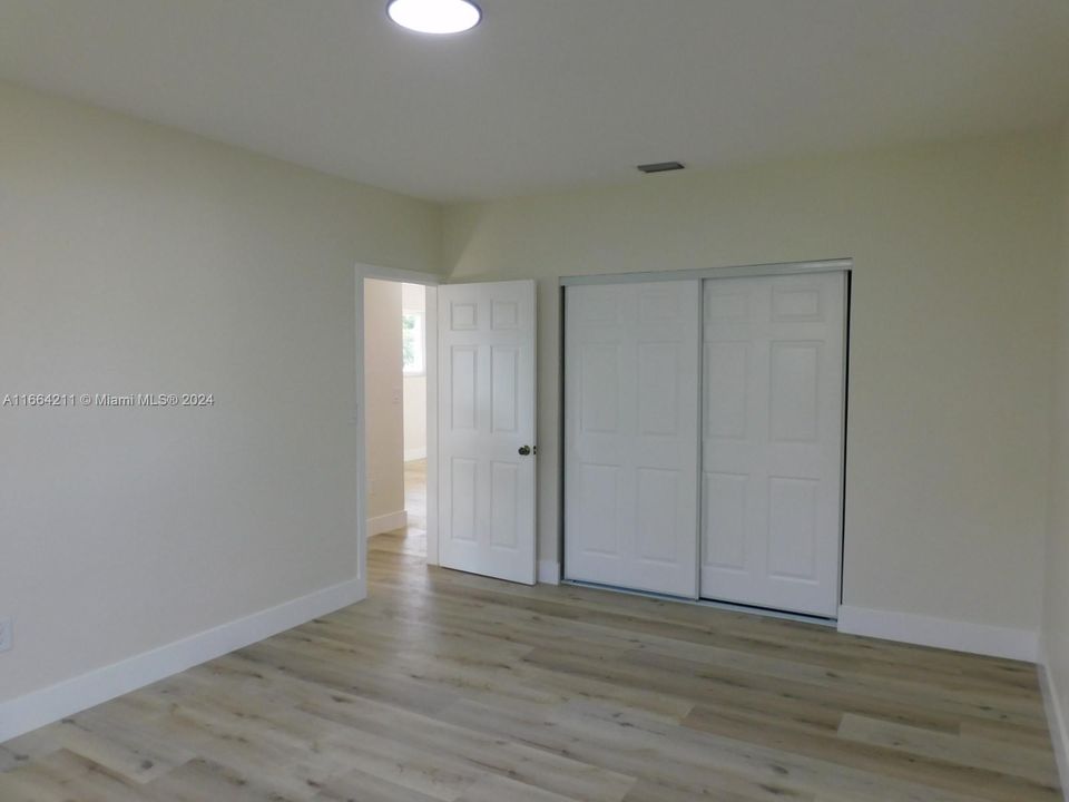 View to primary bedroom entry way.