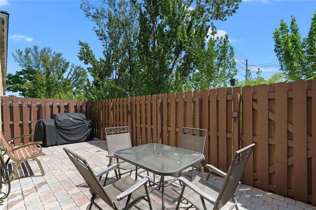 fenced in patio overlooking the canal