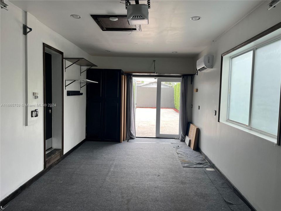 Garage with Double door to Backyard