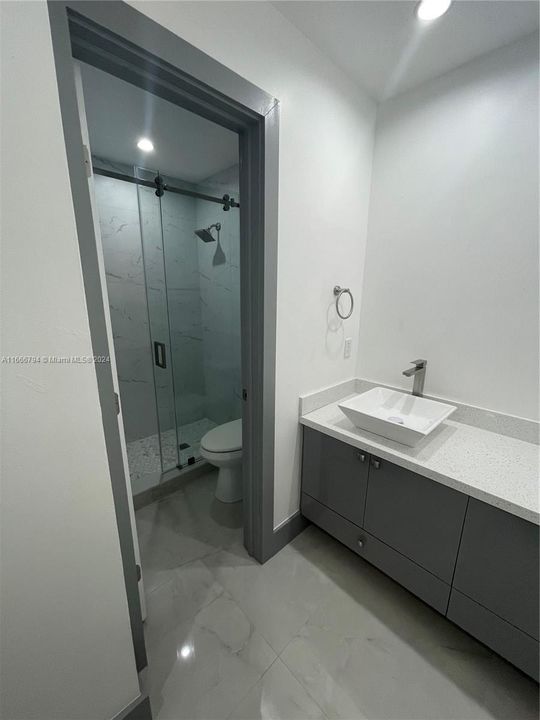 split bathroom divided into separate rooms