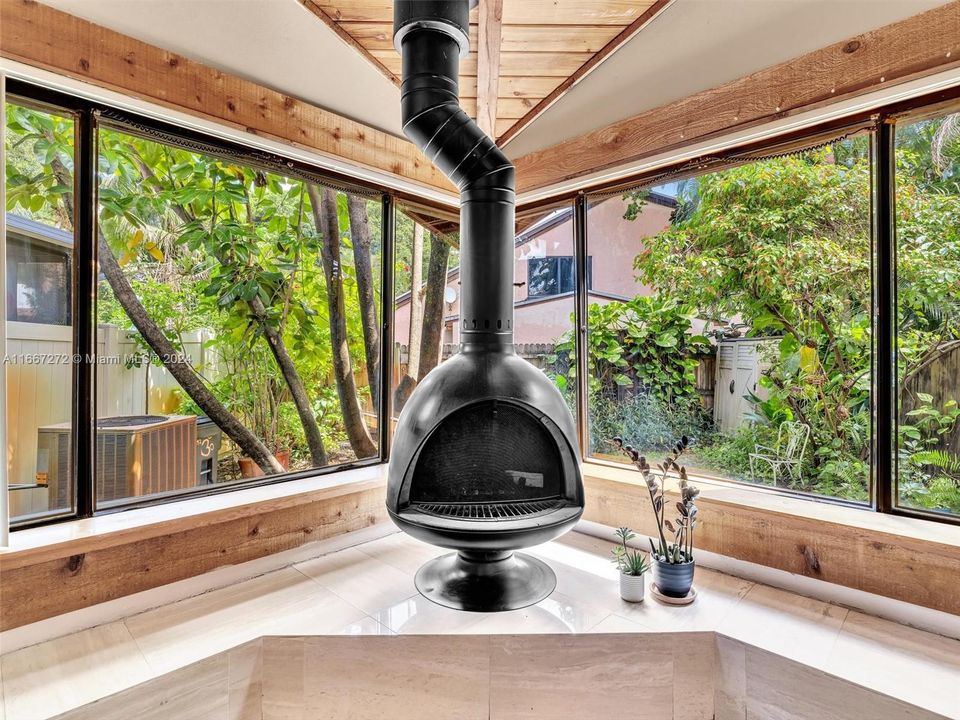 Fireplace Nook with sitting area overlooking the patio.