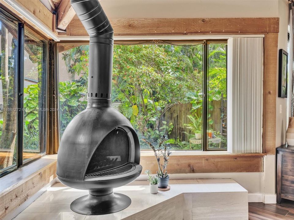 Fireplace Nook with sitting area overlooking the patio.