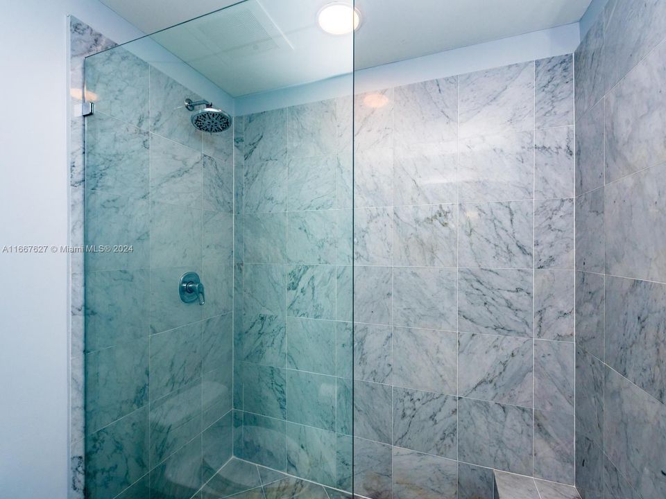 Primary bathroom has shower, 2nd bathroom has tub/shower combo