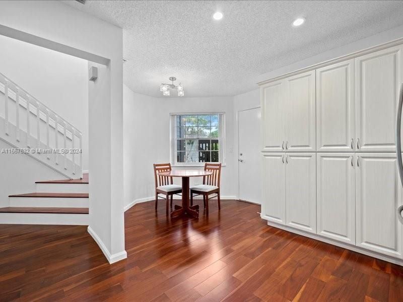 Eat in Kitchen ,nice and bright with a window. Door leads out to the garage and laundry