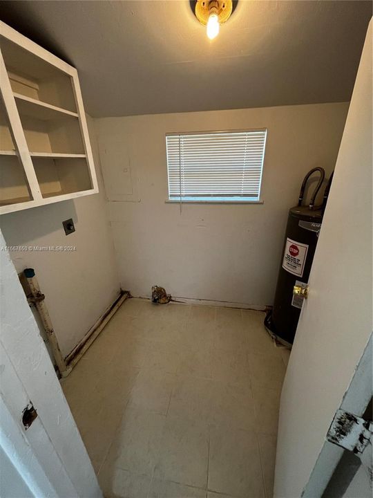 Laundry/storage room with washer/dryer hook up