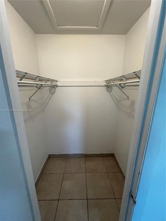 walk in closet in bedroom