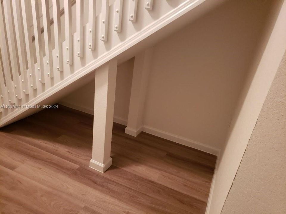 Additional storage under stairs