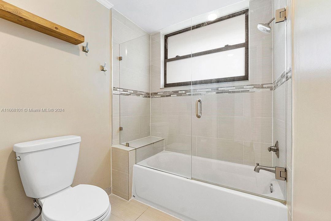 Bathtub and shower in Primary Bathroom