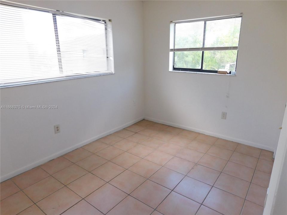 2nd bedroom with extra windows - corner unit