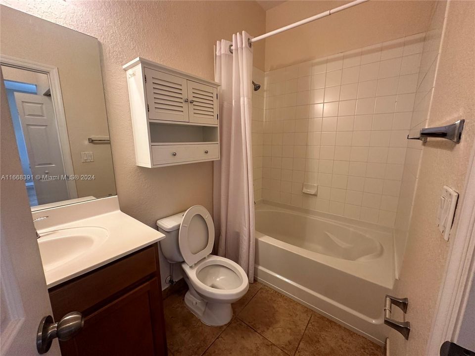 Master bathroom with tub & shower