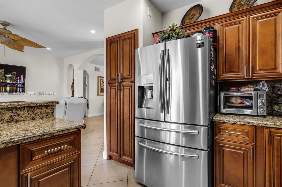 kitchen plenty of cabinets with granite countertop