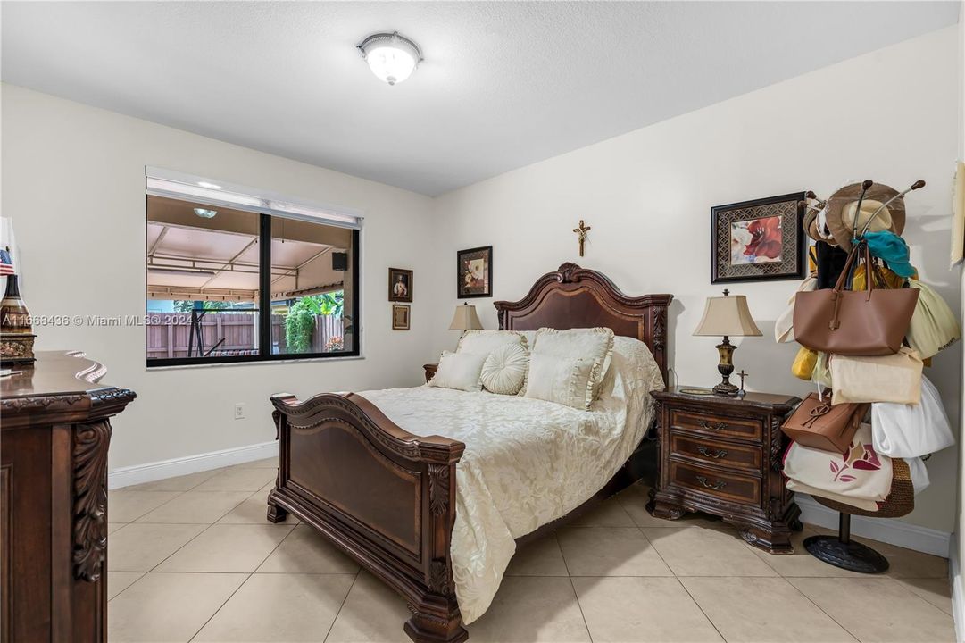 Primary bedroom with view to the patio