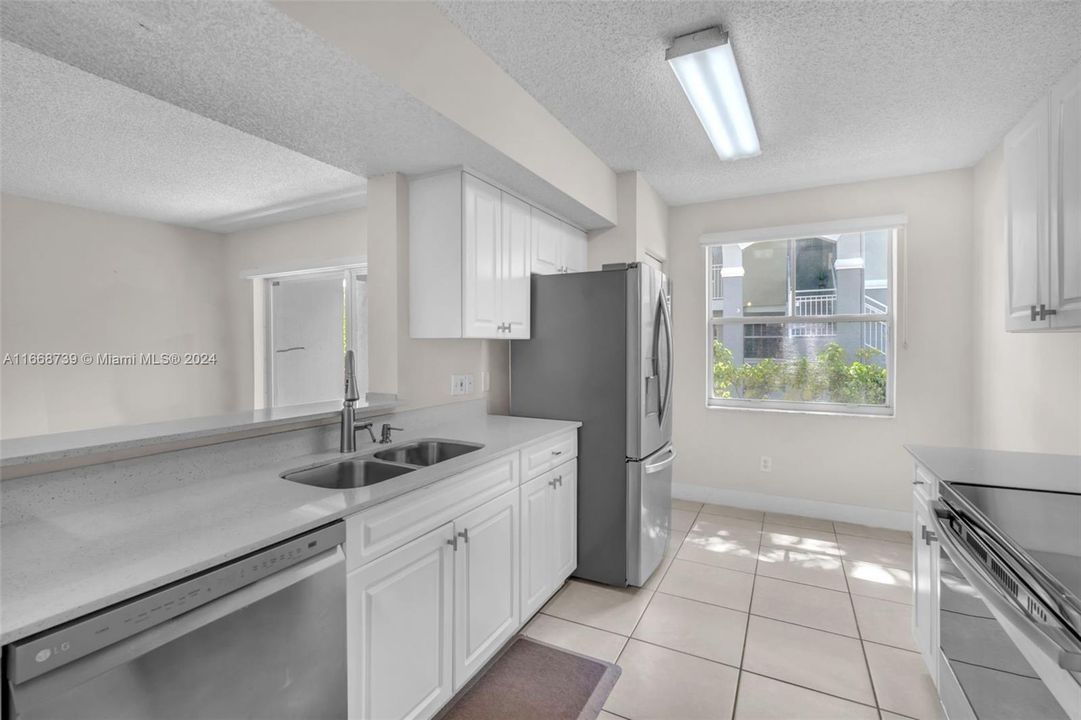 Kitchen - Speckled White Countertops