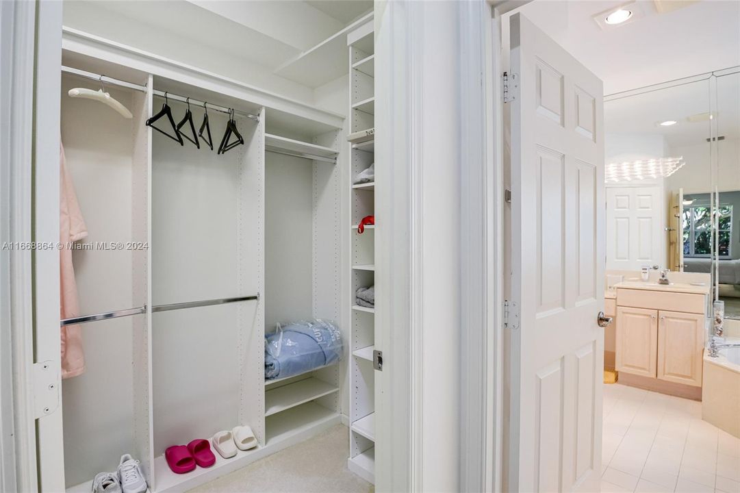 2 Professional closets in the Primary Bedroom