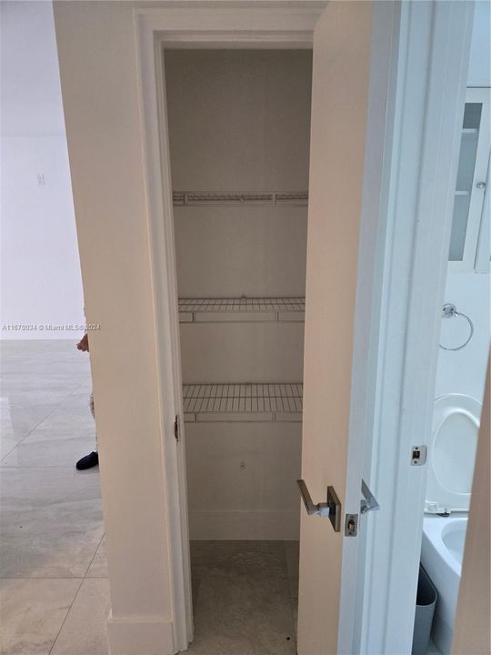 linen closet in hallway