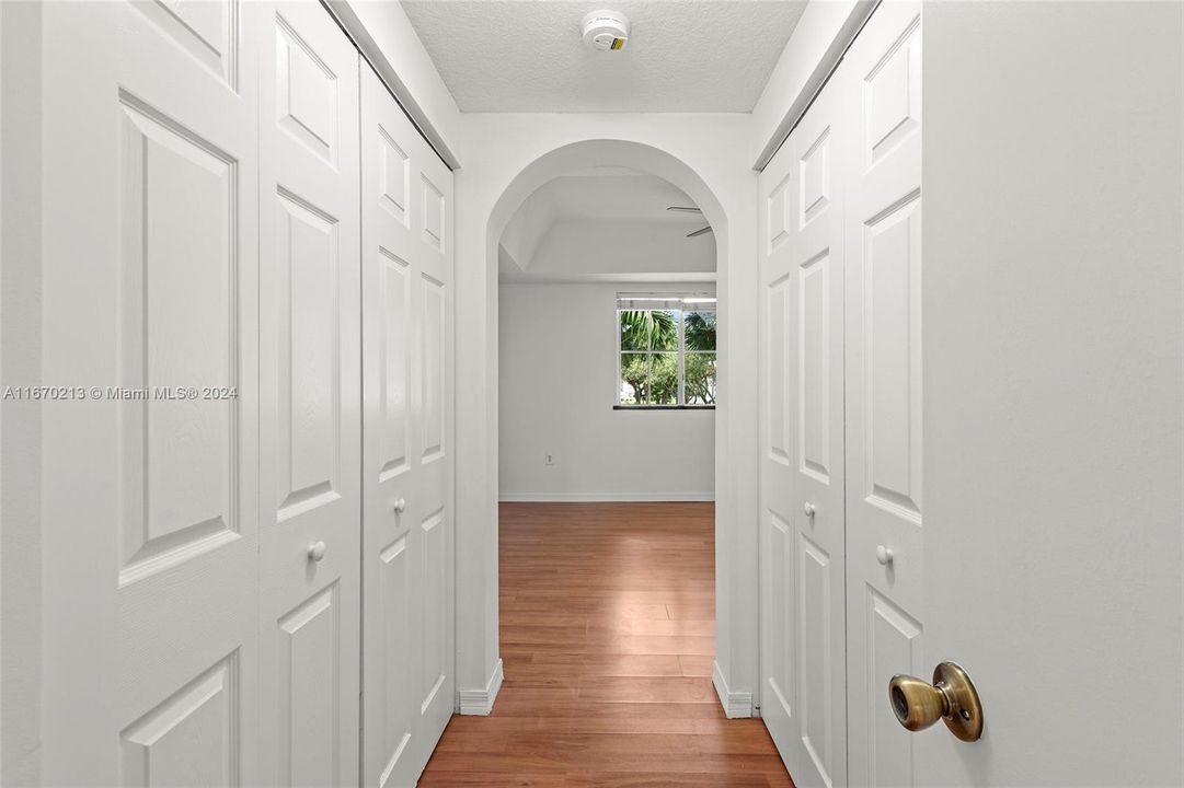 Entrance to Bedroom- 2 huge walk-in closets on each side.