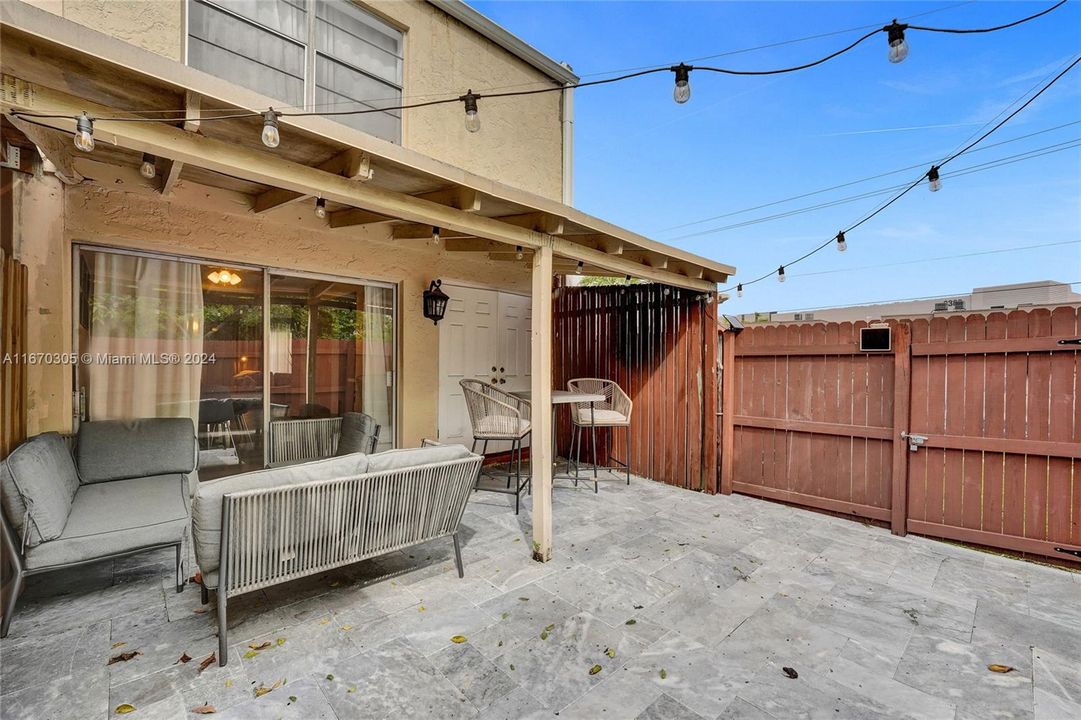 Tiled Covered and Fenced Patio