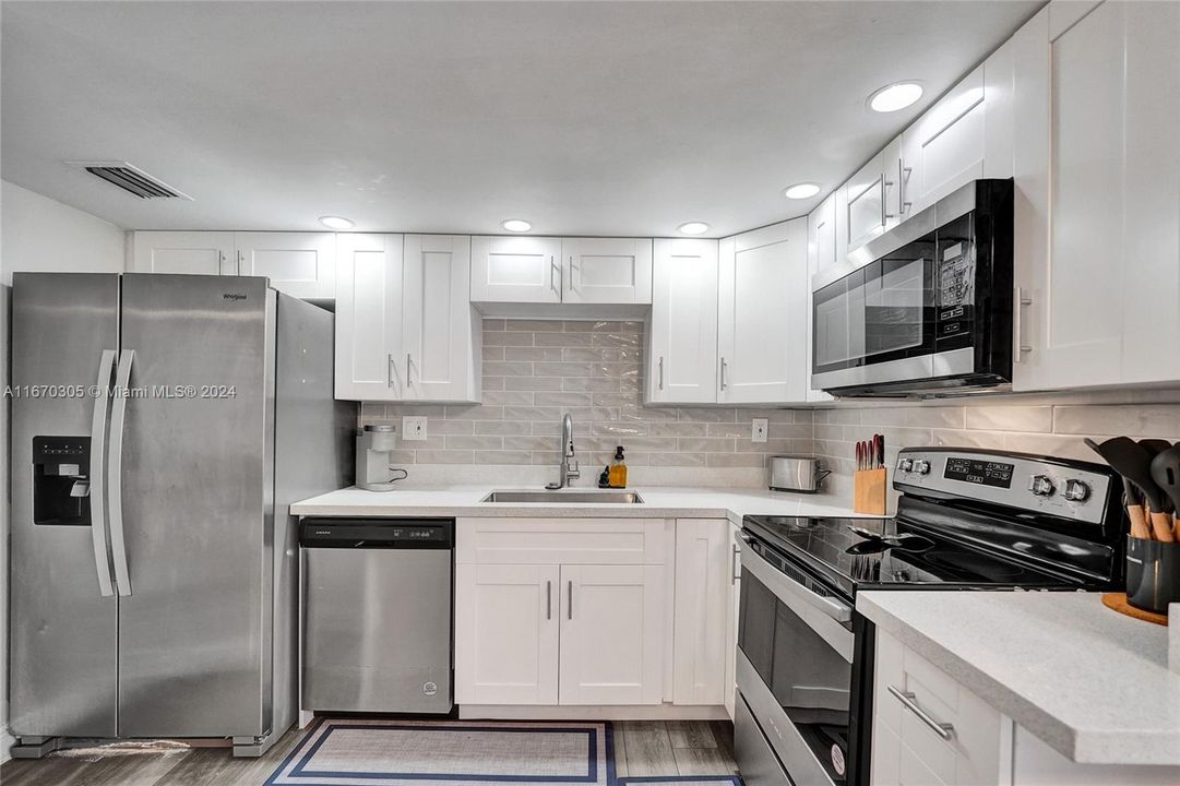 Accented with tile backsplash!