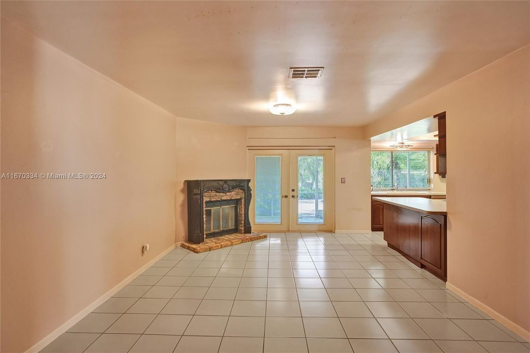 Off of the kitchen with a pool view!