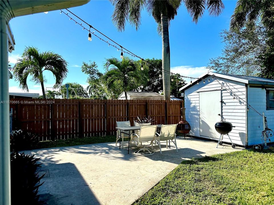 concrete patio and storage shed