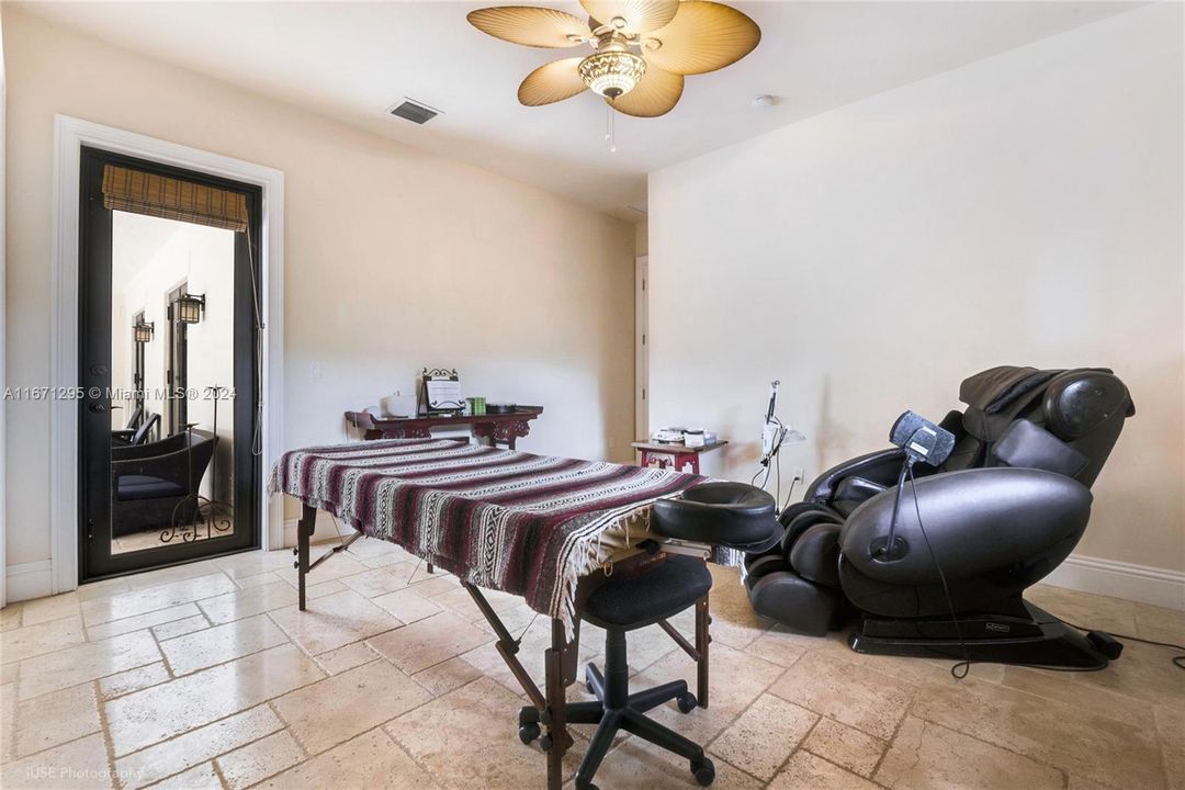 Bedroom 3 with access to patio/pool