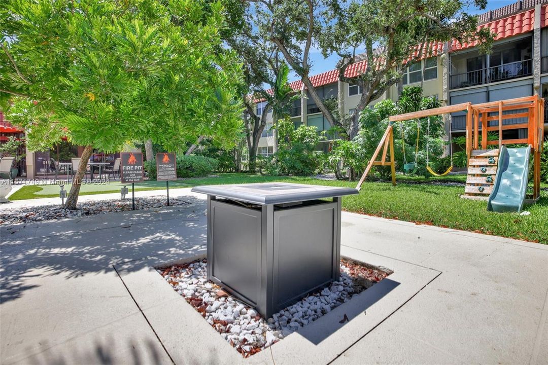 Fire pit and child play area.