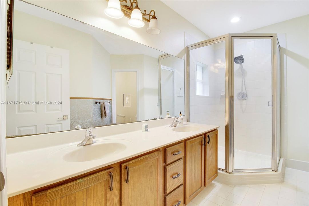 Main bath with Double sink and privacy potty