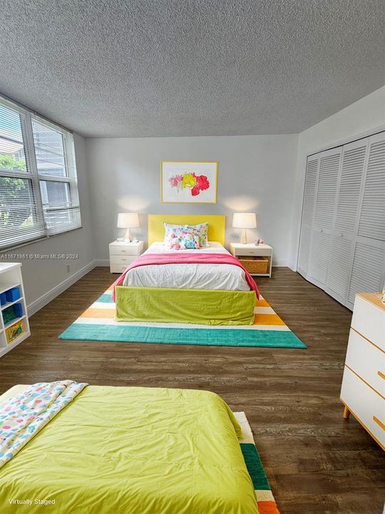 Third bedroom can be a kids room. Virtually staged