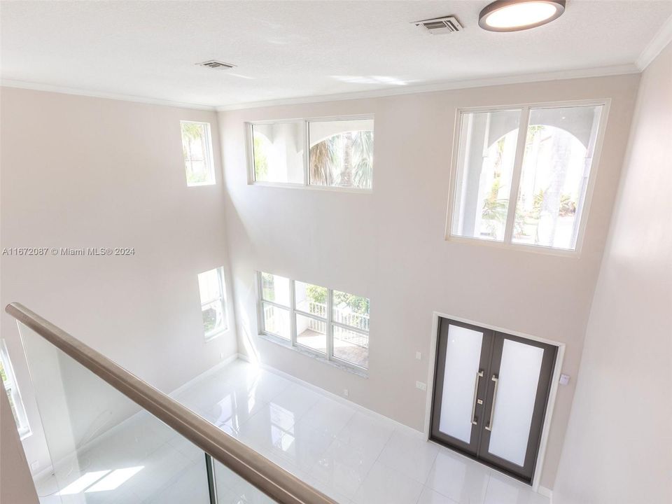 Double height ceiling in living room/foyer areas.